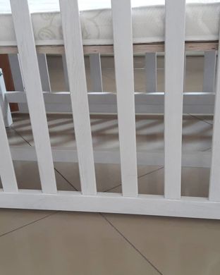 Дитяче дерев'яне ліжечко Римма 60&times;120 см, у білому кольорі, з маятником фото