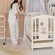 Детская деревянная кроватка Lili 60&times;120 см, цвета слоновая кость, с маятником и ящиком фото